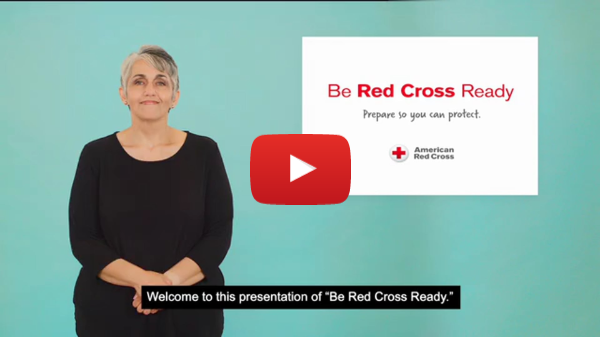 Be Red Cross Ready in American Sign Language - Woman in front of a teal background with a Red Cross logo next to her. Be Red Cross Ready in American Sign Language - Woman in front of a teal background with a Red Cross logo next to her.
