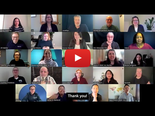 Video Thumbnail: A still gallery of DEAF, Inc. staff looking at the camera. The red soft rectangle with white arrow representing “play the video” is on center of the video placeholder. On bottom of the picture, it has a caption saying 'Thank you!' Video Thumbnail: A still gallery of DEAF, Inc. staff looking at the camera. The red soft rectangle with white arrow representing “play the video” is on center of the video placeholder. On bottom of the picture, it has a caption saying 'Thank you!'